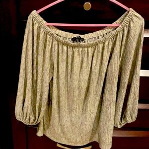 Silver sexy versatile top. Good score